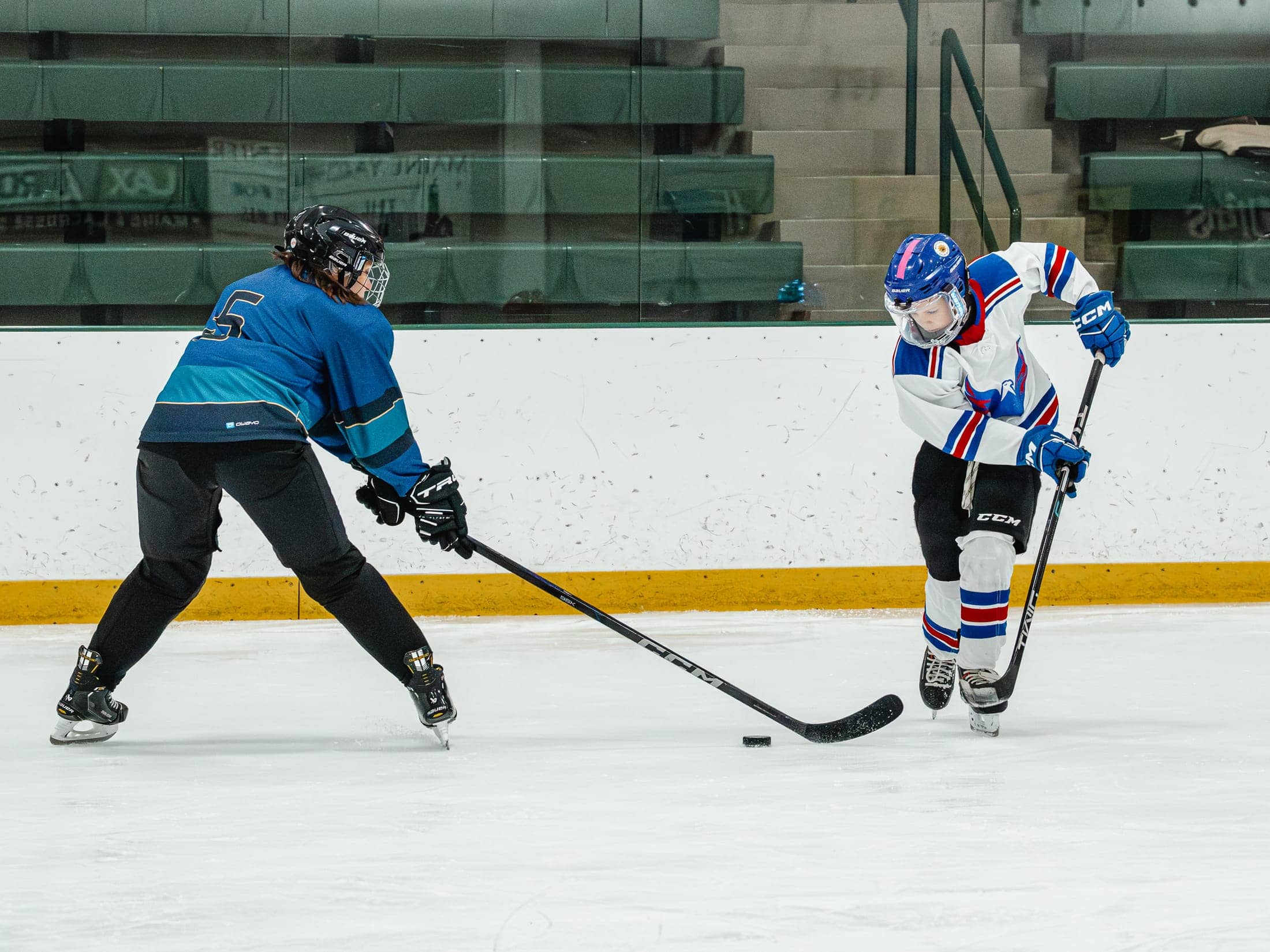 Players on the ice at the Maine Chill Pride Cup