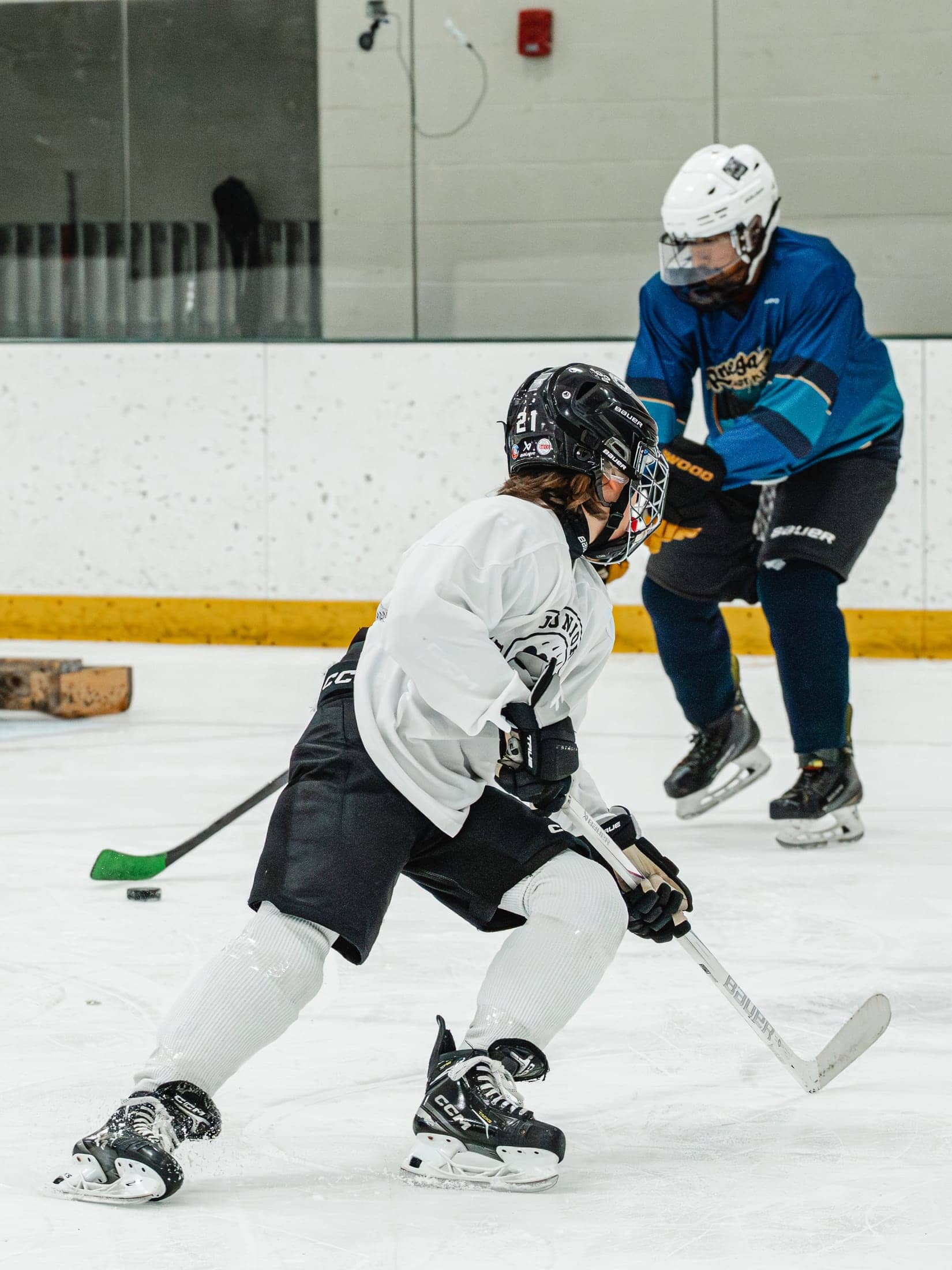 Players on the ice at the Maine Chill Pride Cup