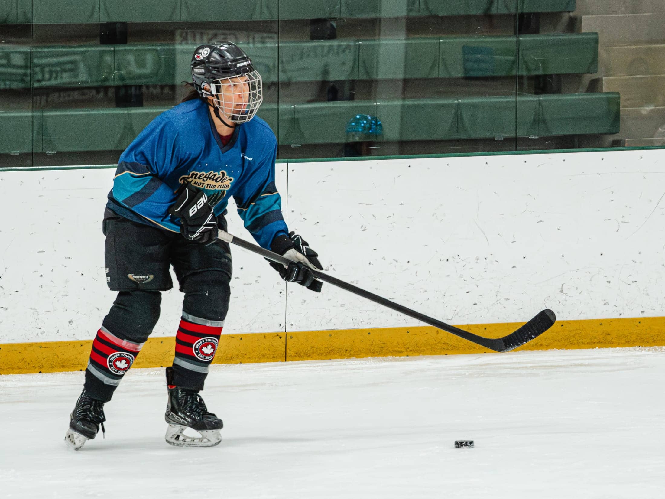 Players on the ice at the Maine Chill Pride Cup