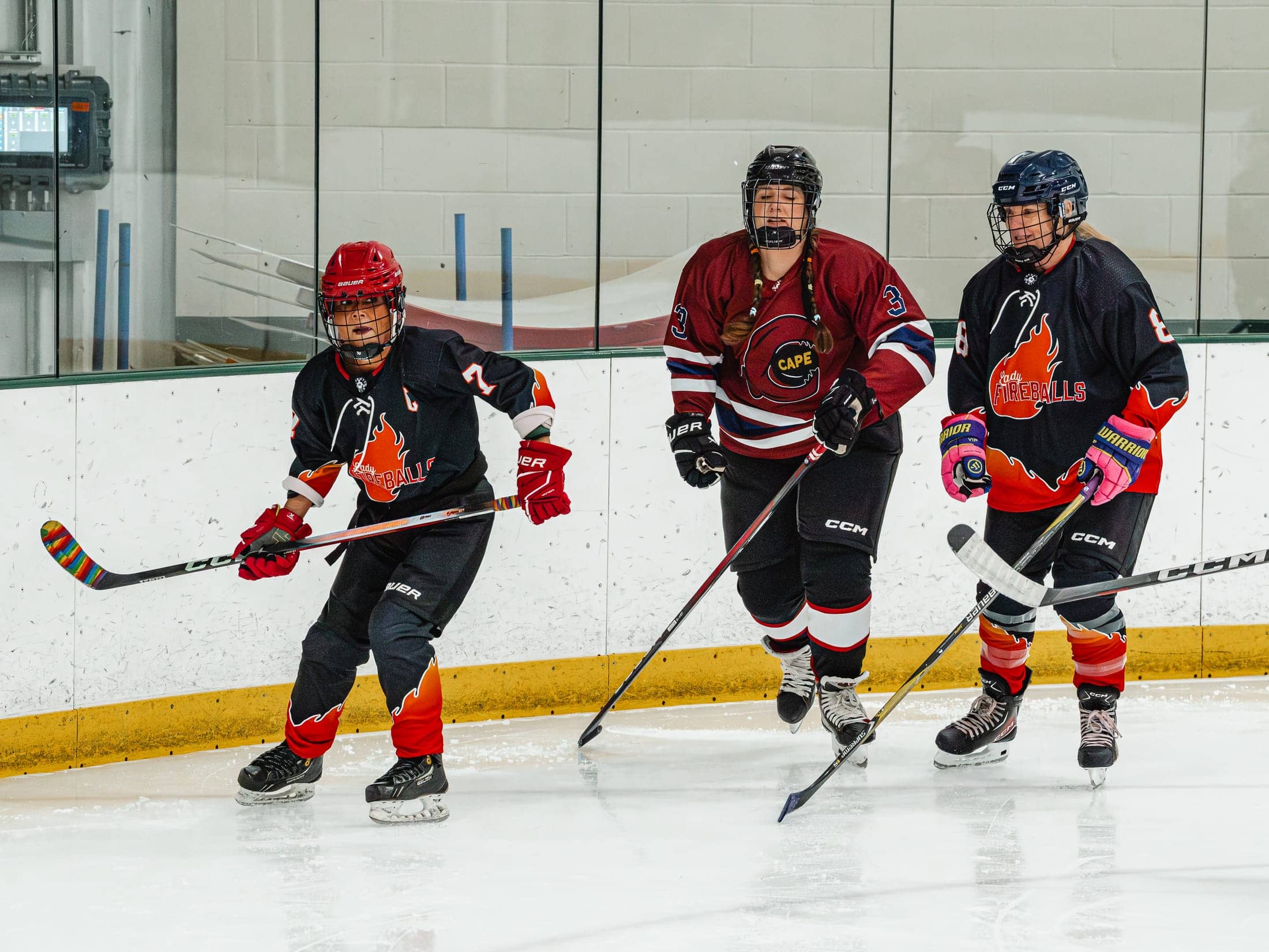 Players on the ice at the Maine Chill Pride Cup