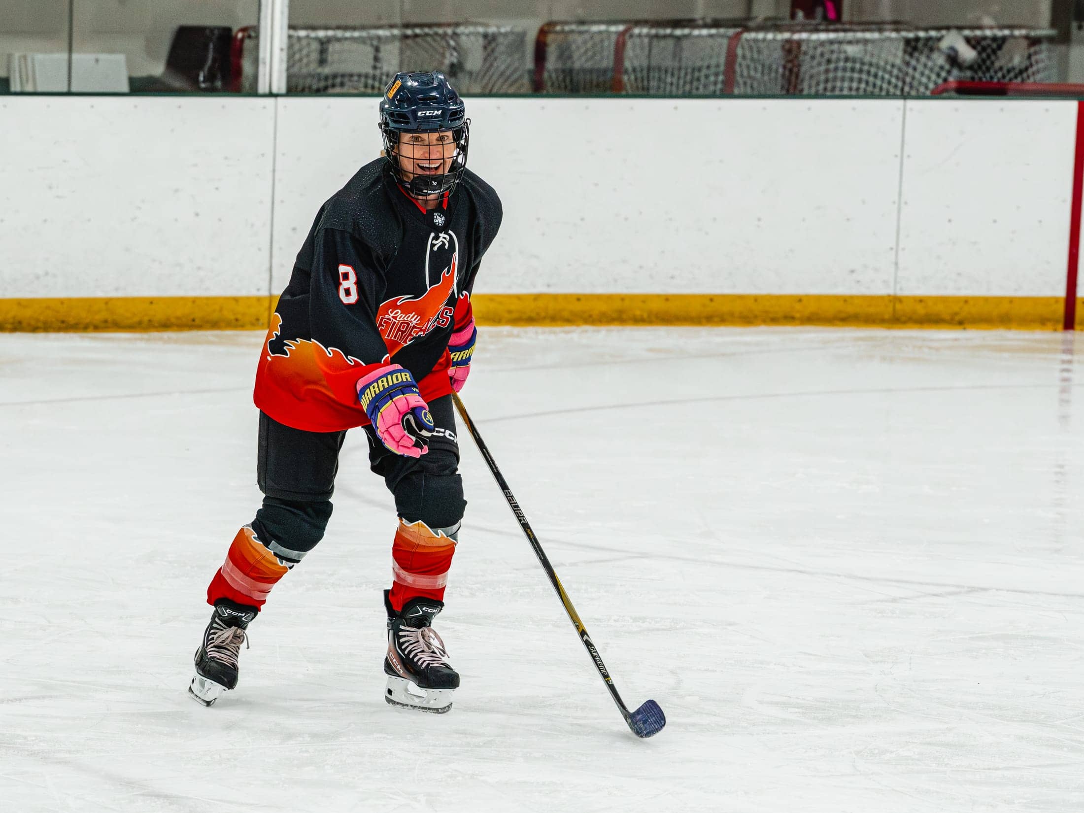 Players on the ice at the Maine Chill Pride Cup