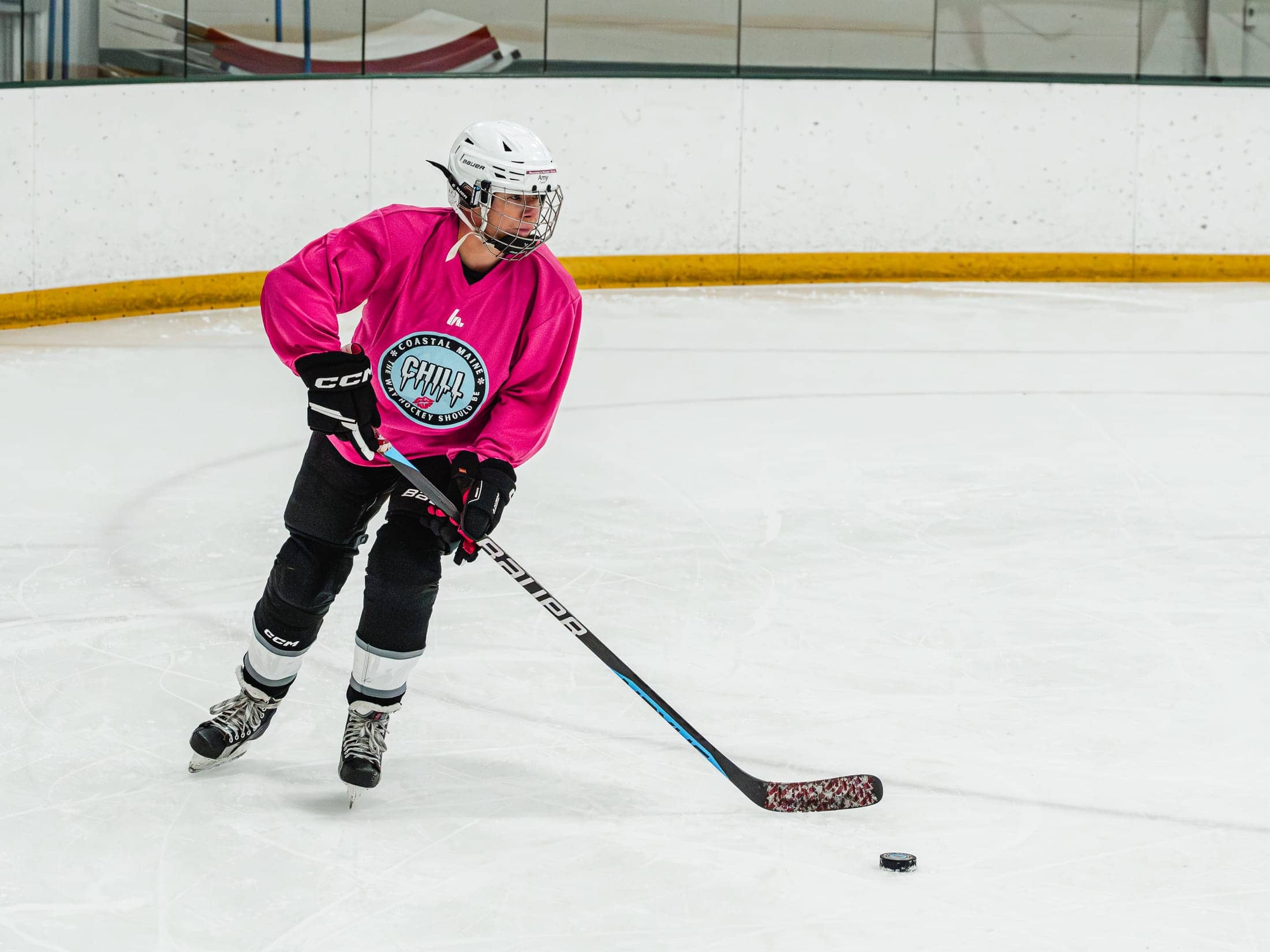 Players on the ice at the Maine Chill Pride Cup