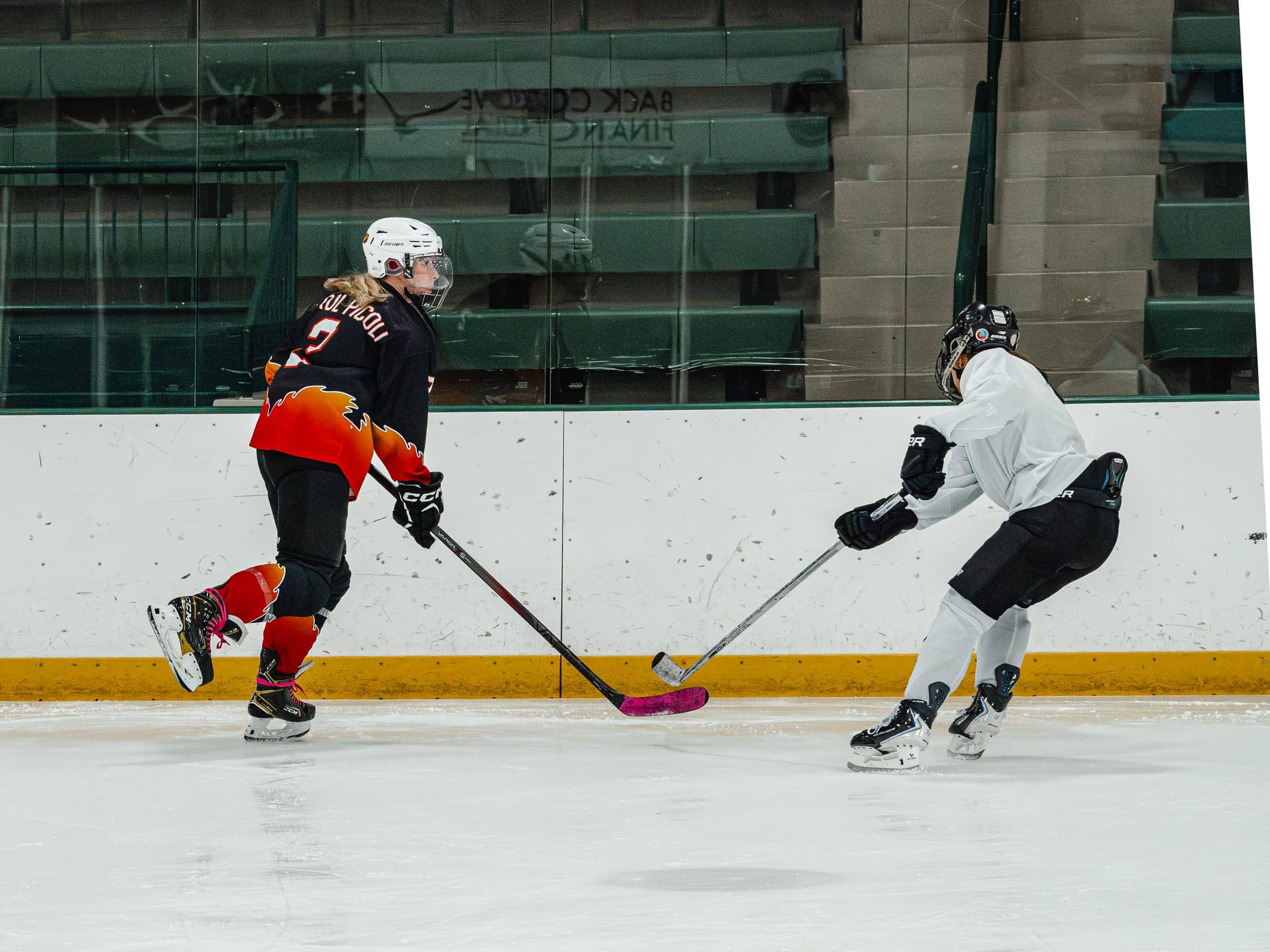 Players on the ice at the Maine Chill Pride Cup
