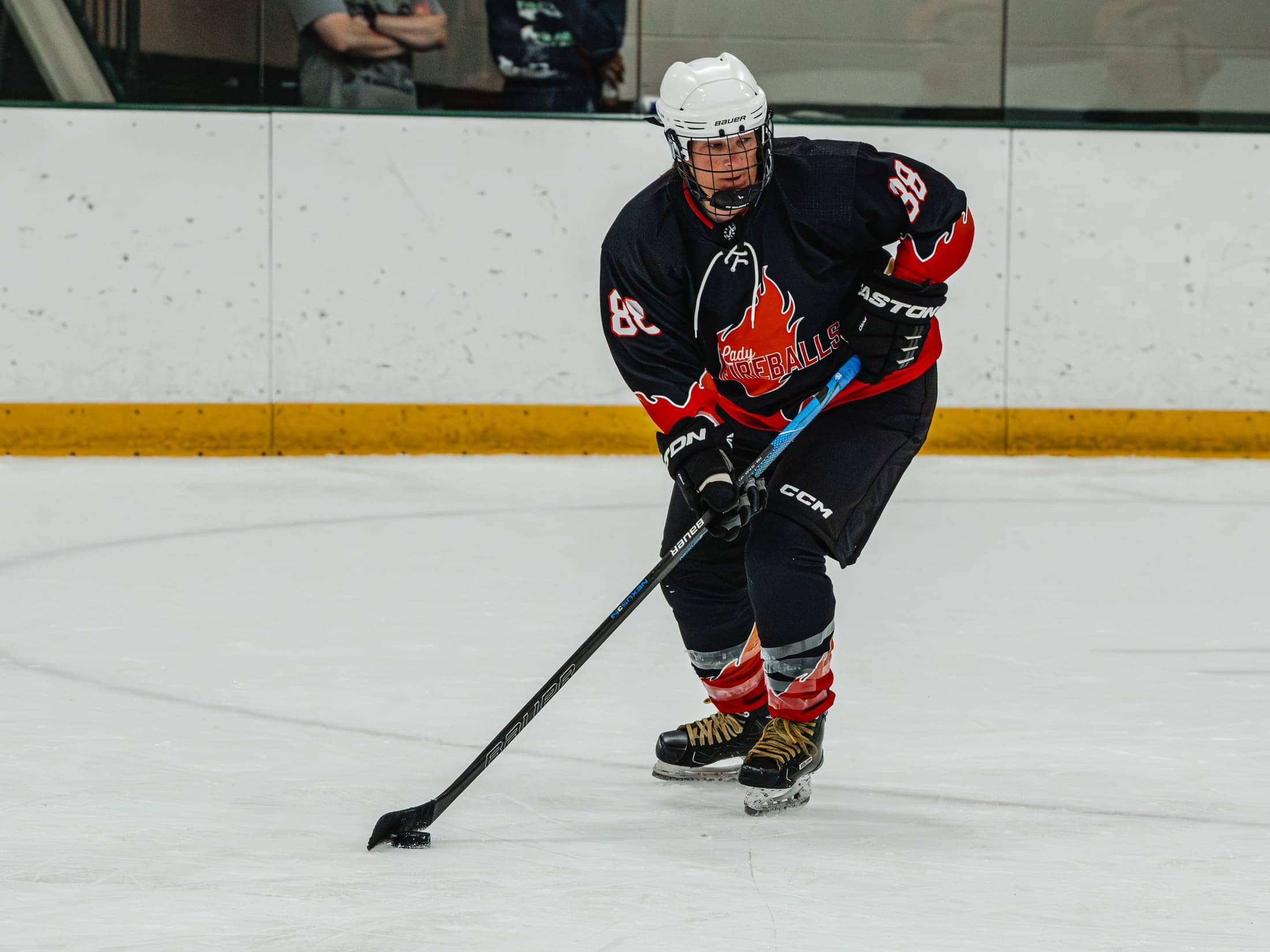 Players on the ice at the Maine Chill Pride Cup