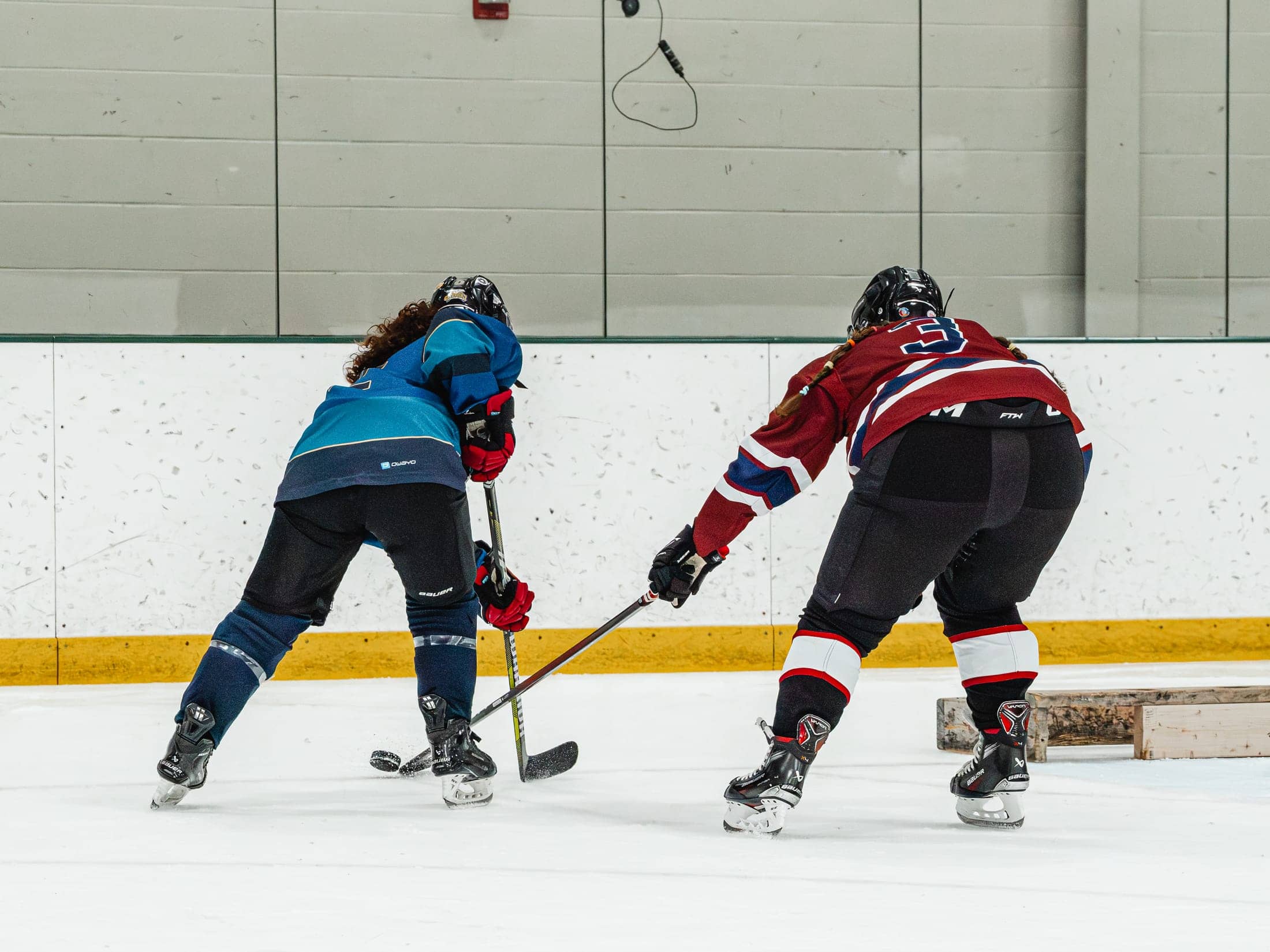 Players on the ice at the Maine Chill Pride Cup