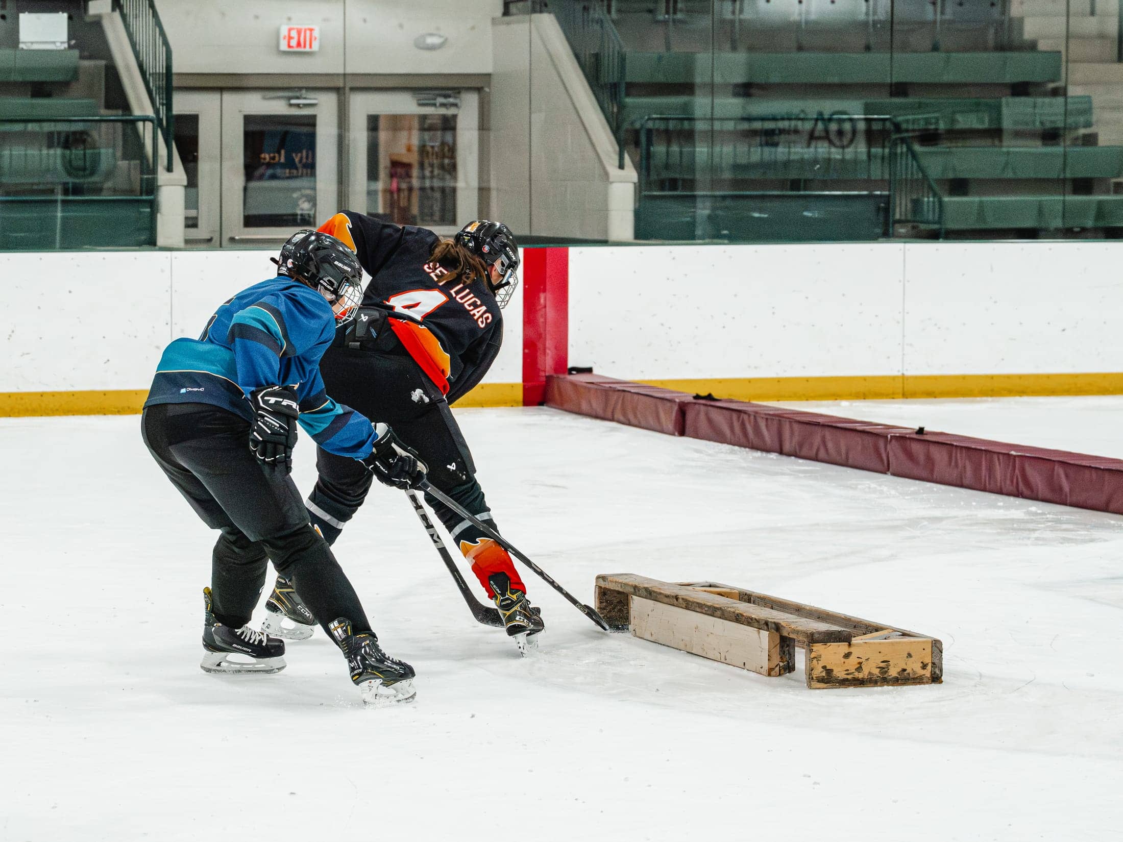 Players on the ice at the Maine Chill Pride Cup