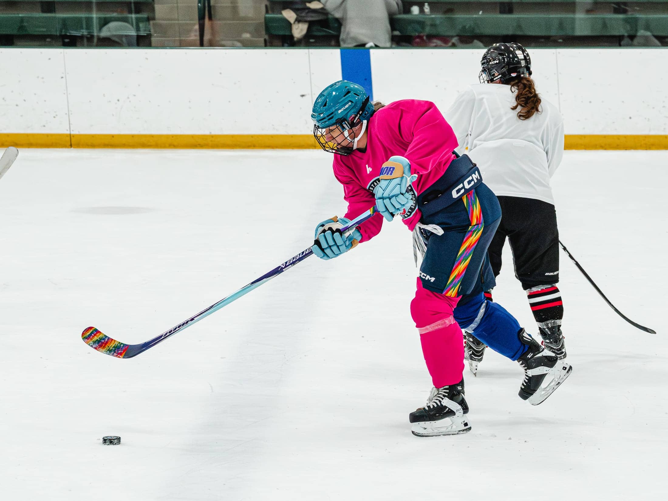 Players on the ice at the Maine Chill Pride Cup