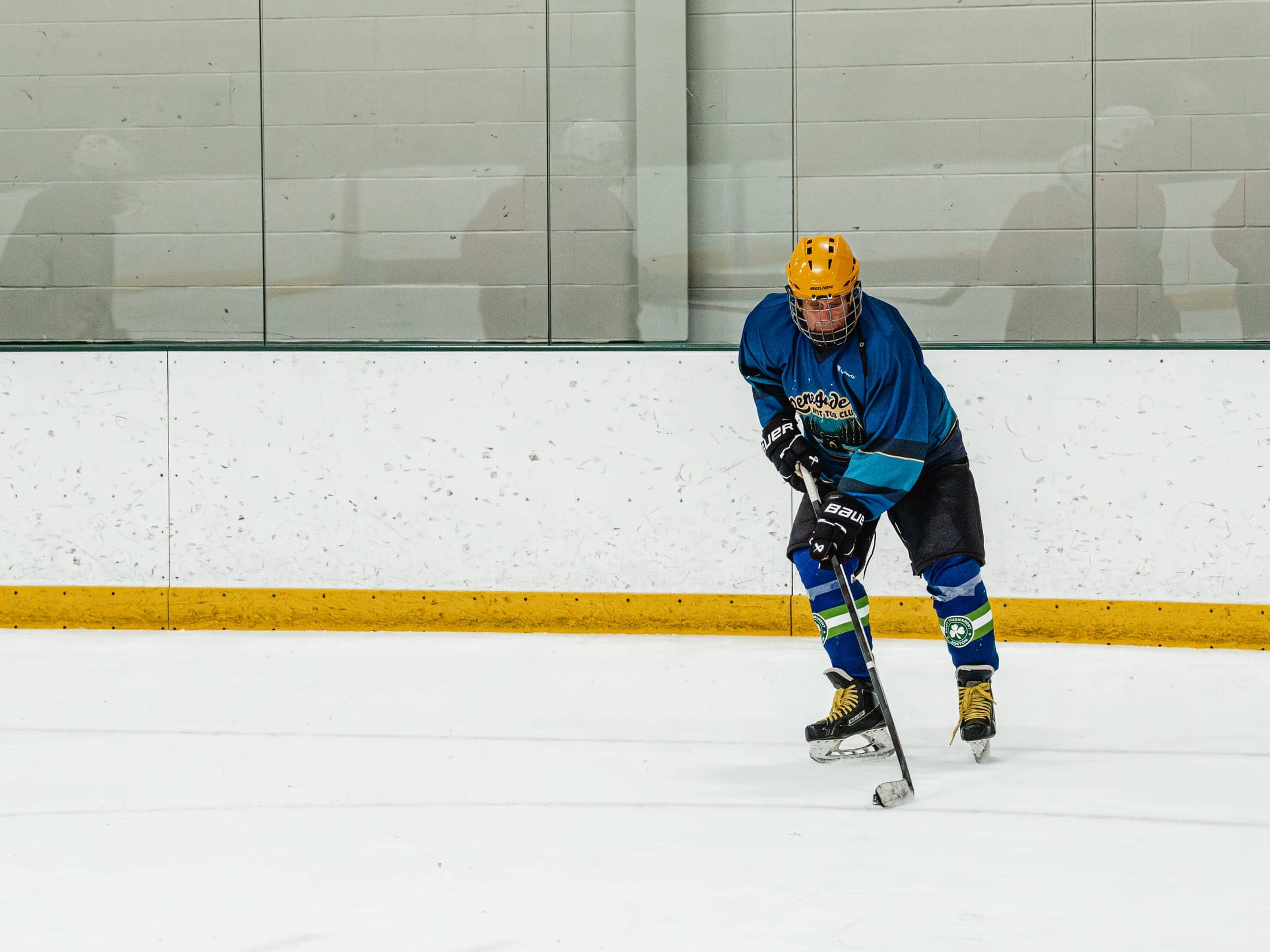 Players on the ice at the Maine Chill Pride Cup
