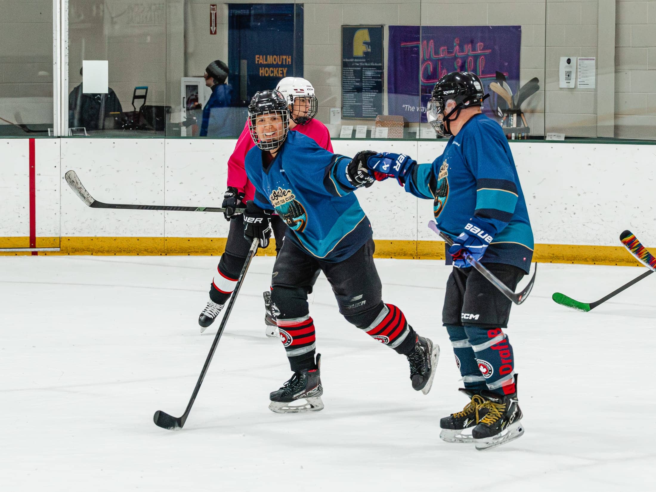 Players on the ice at the Maine Chill Pride Cup
