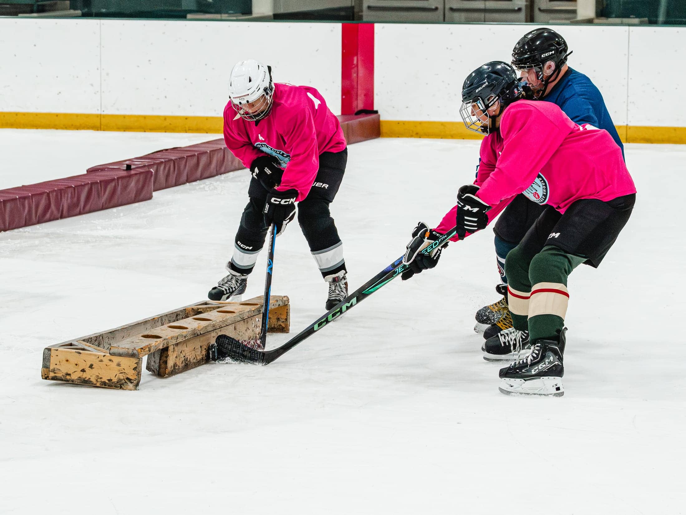 Players on the ice at the Maine Chill Pride Cup