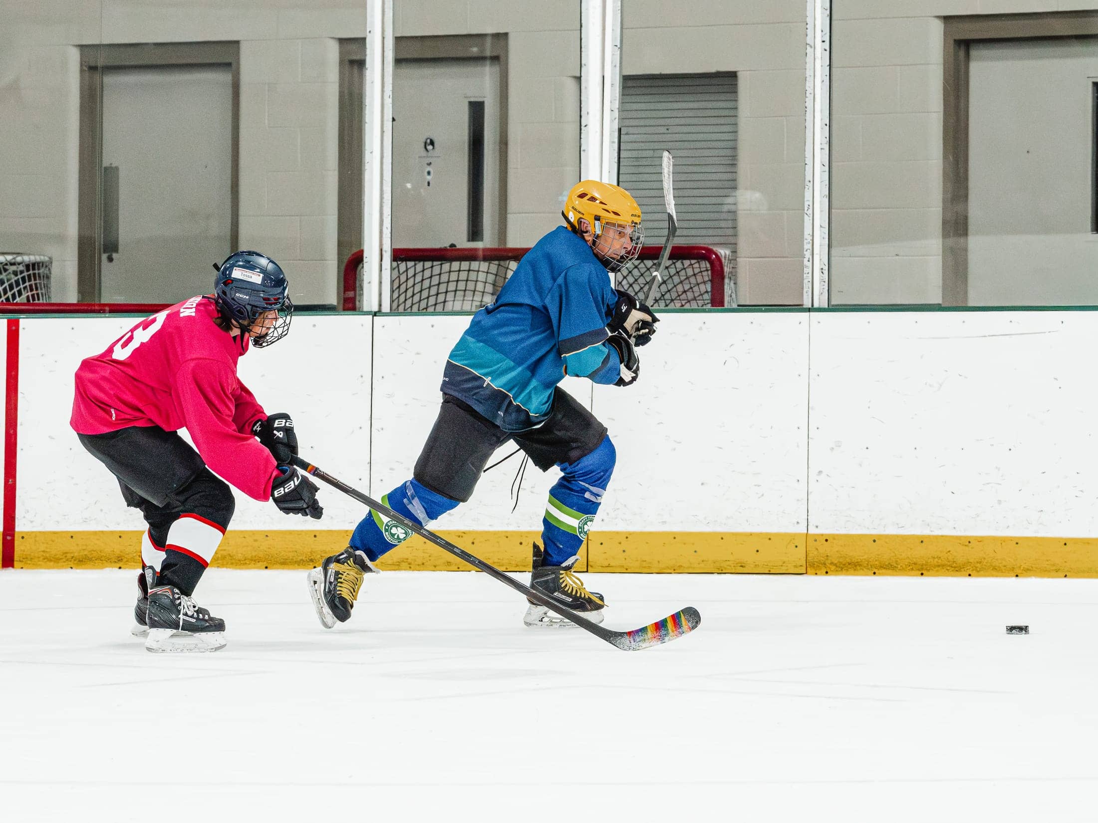 Players on the ice at the Maine Chill Pride Cup