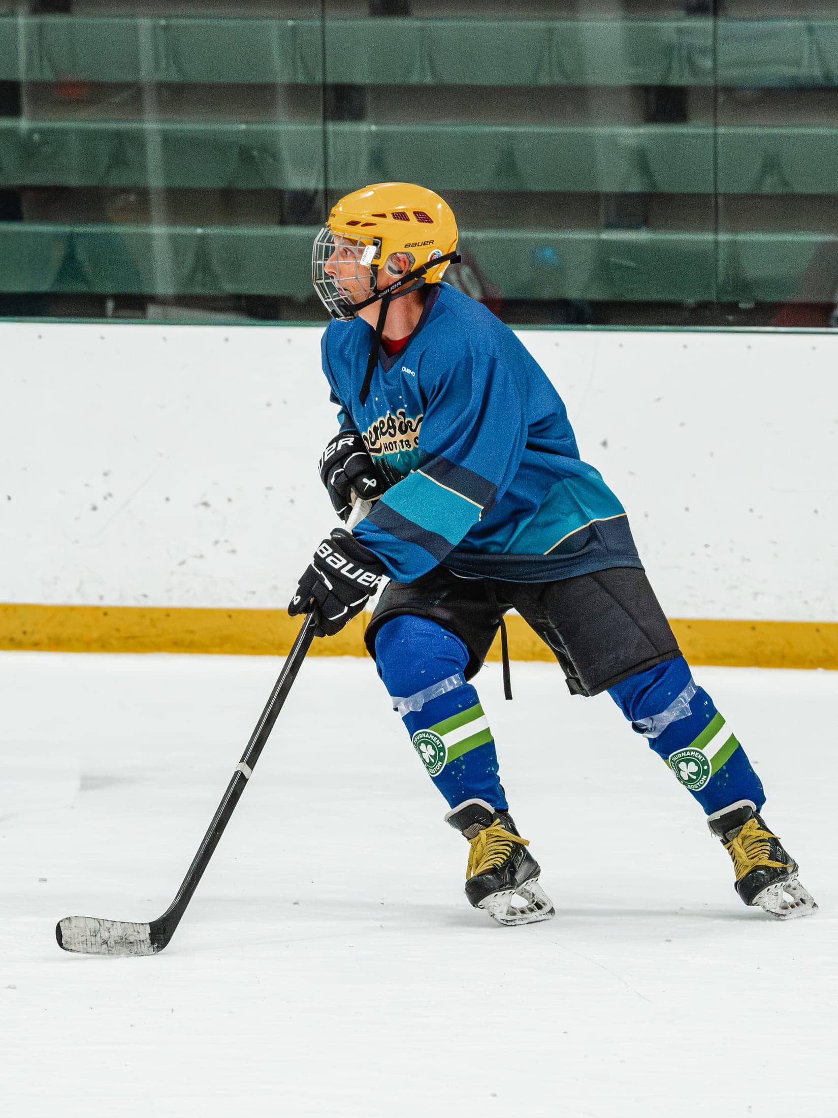 Players on the ice at the Maine Chill Pride Cup