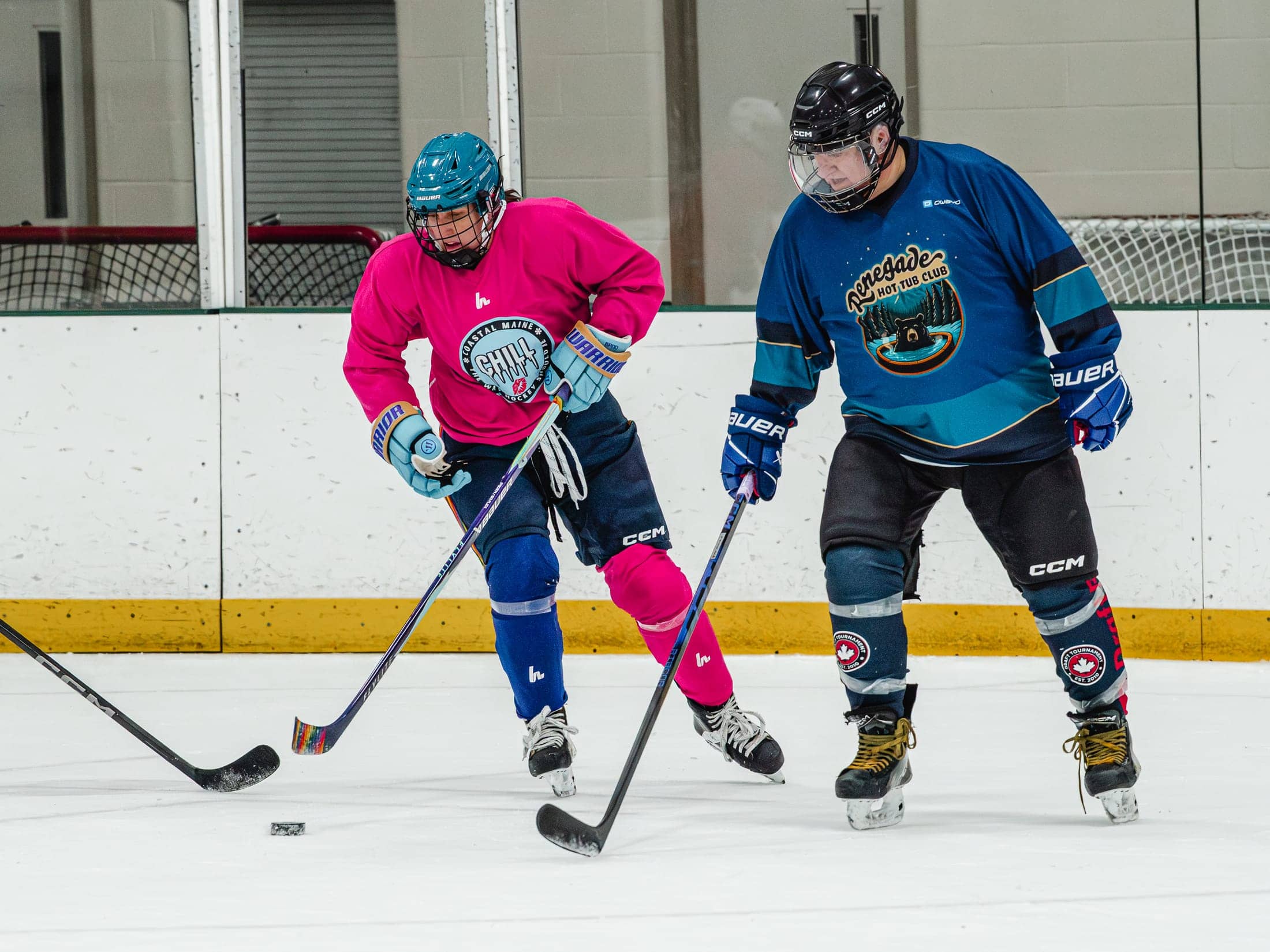 Players on the ice at the Maine Chill Pride Cup