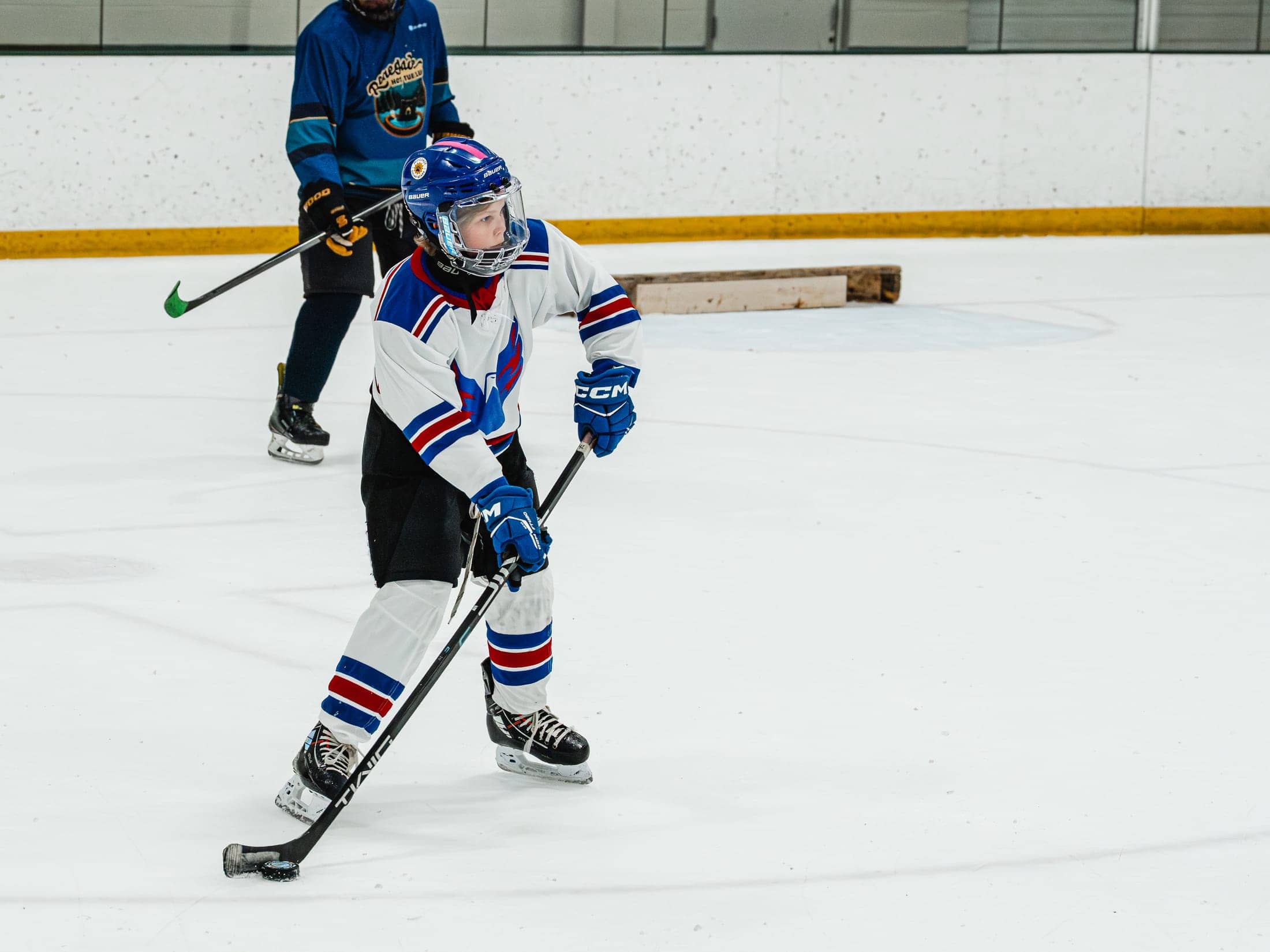 Players on the ice at the Maine Chill Pride Cup