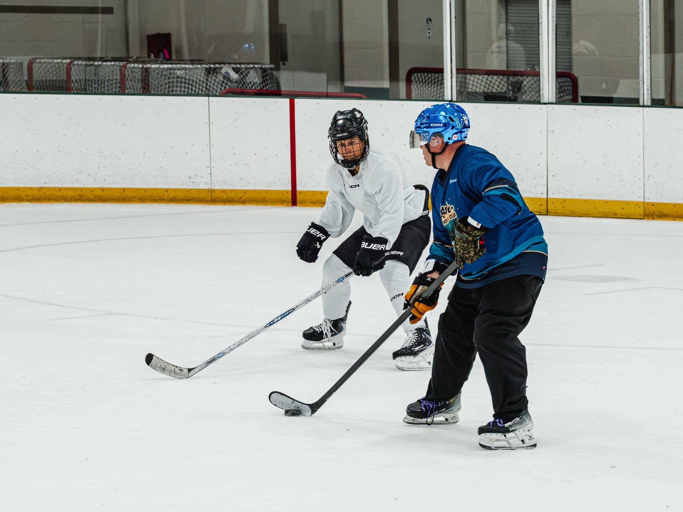 Players on the ice at the Maine Chill Pride Cup